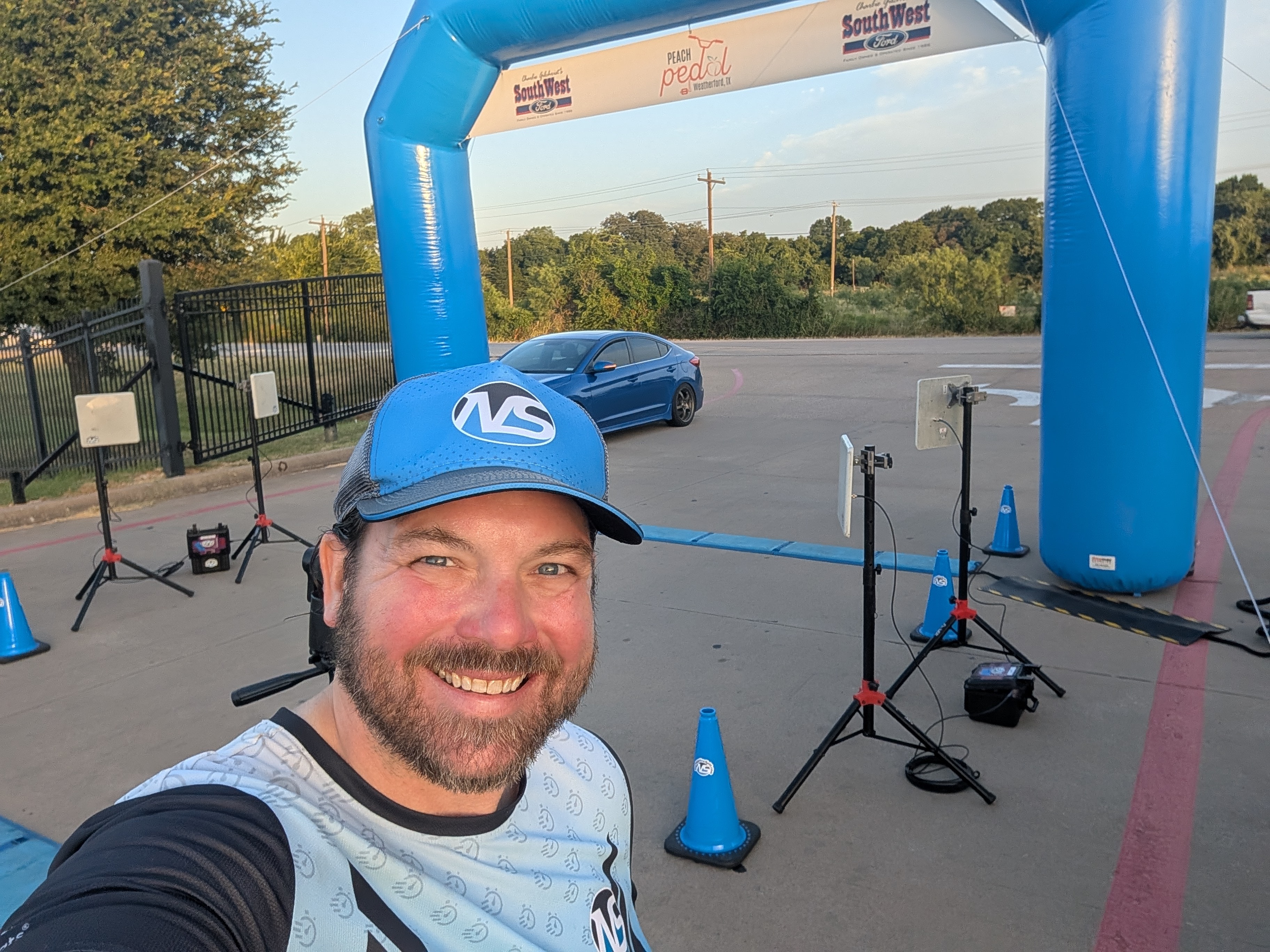 Tony Sapp at a start line with timing equipment set up behind him